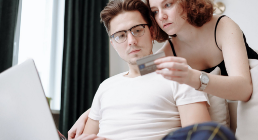 couple using laptop